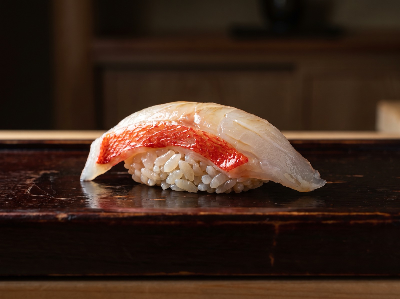 Kinmedai nigiri, the scarlet skin blanched and left on.