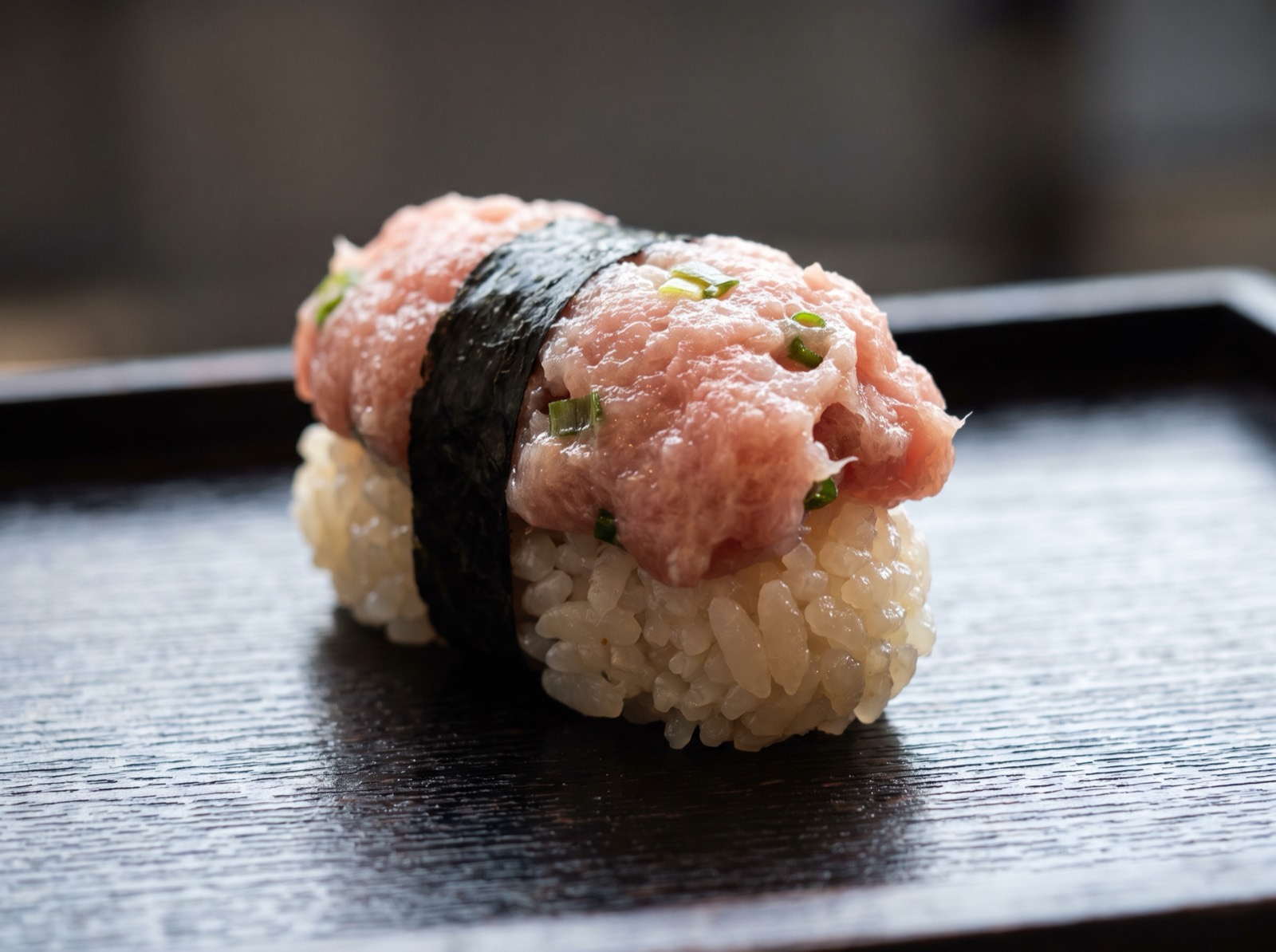 Negitoro gunkan, scraped tuna with chopped spring onion.