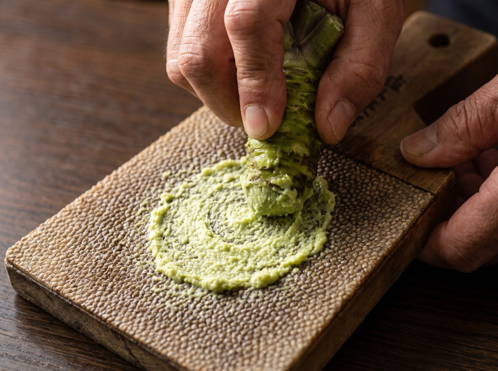 Fresh wasabi grated on a sharkskin board.