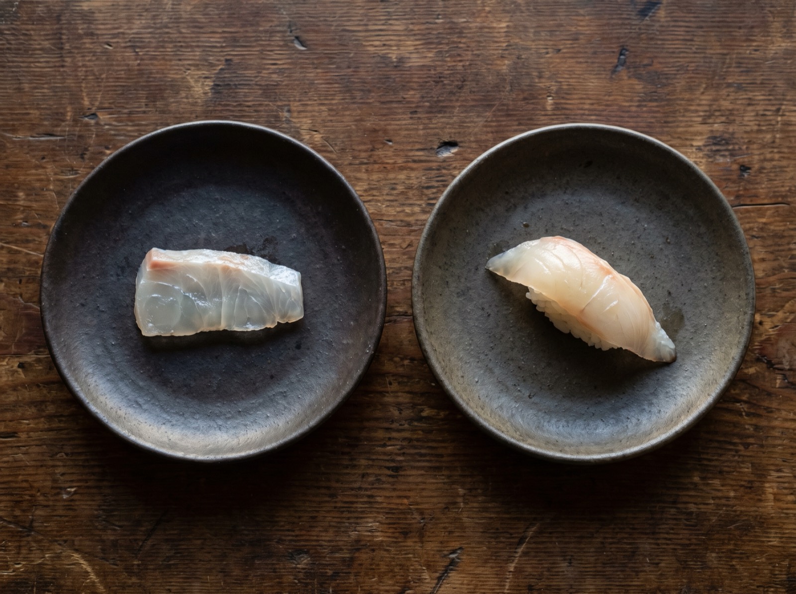 The same cut of fish, once as sashimi and once as nigiri.