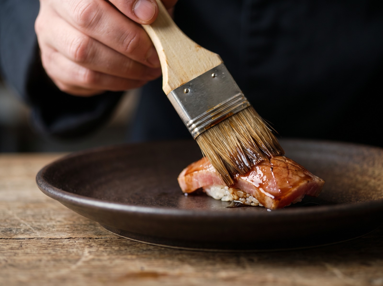 Nikiri soy glaze brushed onto a piece before it is served.
